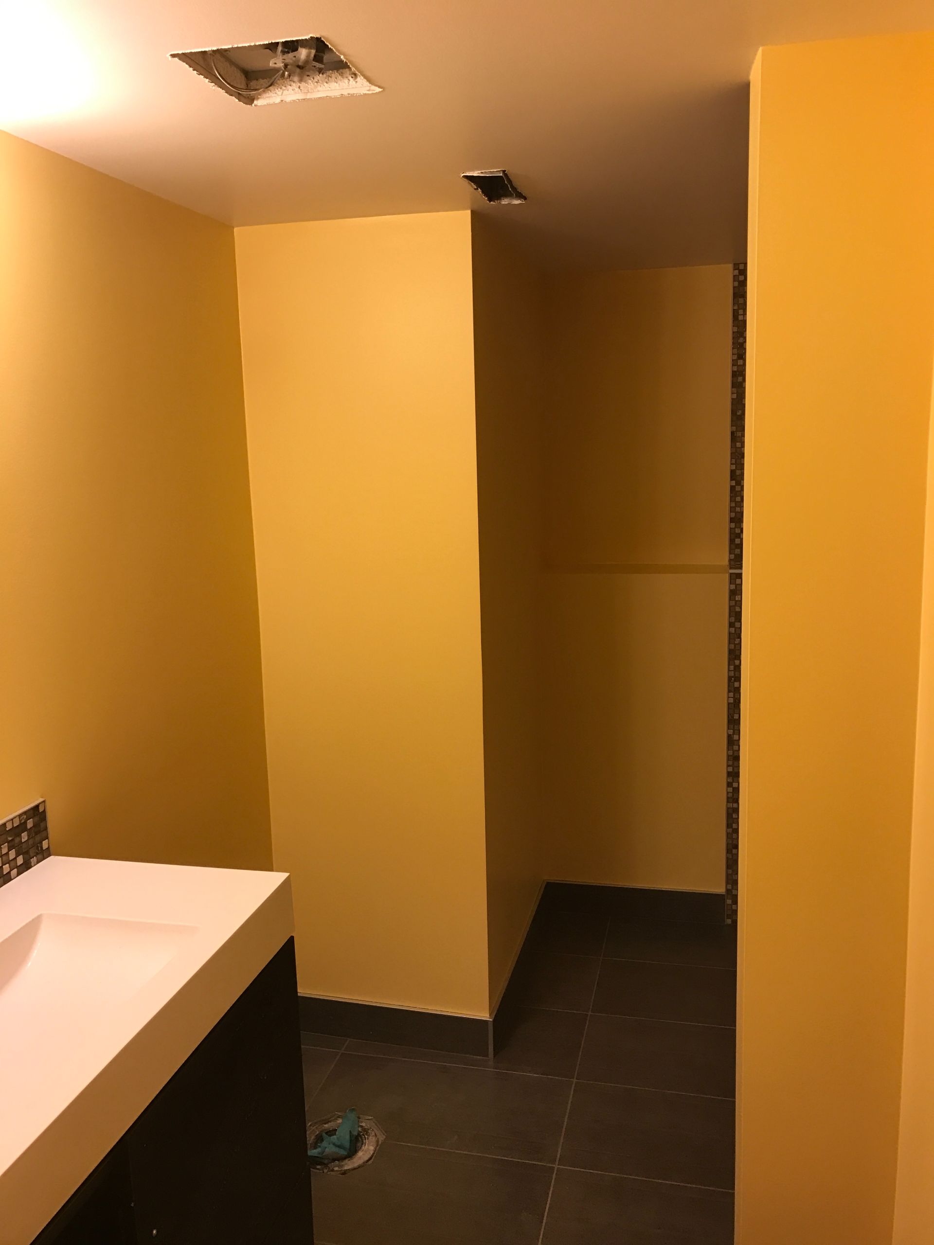 Yellow bathroom walls after